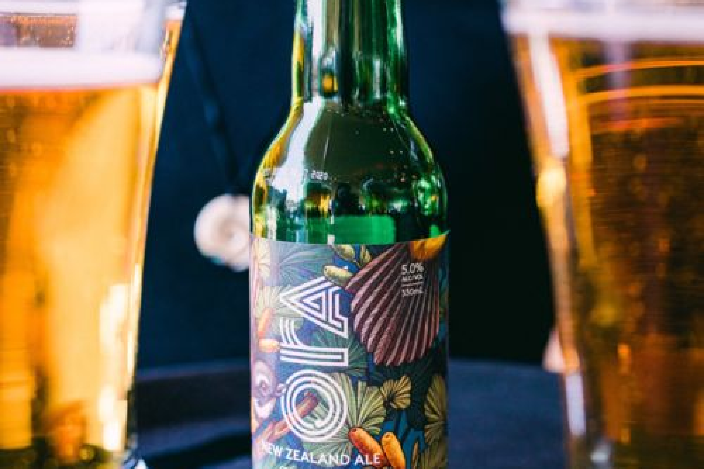 Photo of a beer bottle with a label wrapping